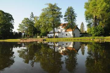 Фото Отели типа «постель и завтрак» Gościniec Zielony Domek г. Мронгово 3