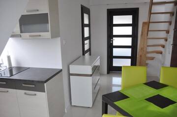 Фото номера Апартаменты - Двухуровневые Апартаменты Apartament Wilenska г. Мронгово 11